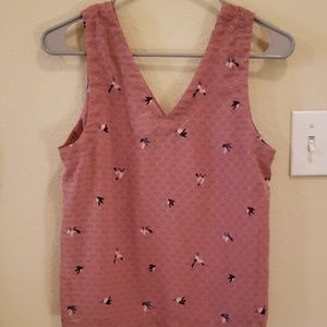 Pink sleeveless blouse